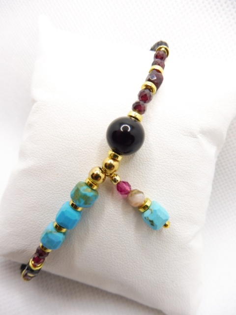 Bransoletka z Obsydianem,Magnezytem,Granatem, Opalem i Spinel